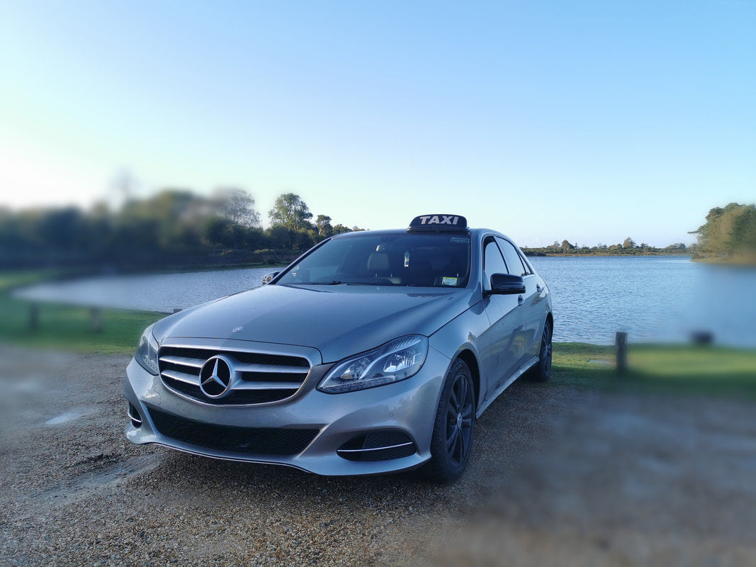 New Forest Taxis driver and vehicle